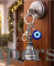 Charm bell with evil eye